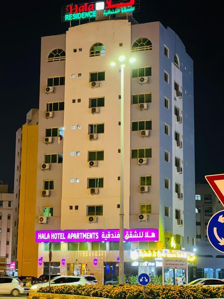 Hala Hotels Apartments Sharjah Esterno foto